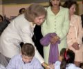 Una alumna del Colegio 'Daniel Vázquez Díaz' se dirige a la Reina, en presencia de la princesa Lalla Meryem, hermana del Rey Mohamed VI de Marruecos
