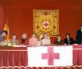S.M. la Reina preside la Mesa Principal de la Fiesta de la Banderita, a beneficio de la Cruz Roja, en la Carrera de San Jerónimo