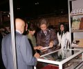 La Reina, durante su visita al stand de la Fundación Reina Sofía