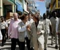 Doña Sofía y la secretaria de Estado de Cooperación Internacional, Soraya Rodríguez, acompañadas por autoridades haitianas pasean por las calles de...