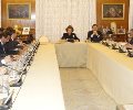 La Reina durante la firma del convenio