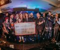 artistas y organizadores participantes en la subasta solidaria, junto George Sharp, general manager de Hard Rock Cafe Madrid, Jose Luis Nogueira, s...