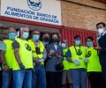 Su Majestad la Reina Doña Sofía junto al presidente del Banco de Alimentos, Indalecio García; el alcalde de Granada, Francisco Cuenca y los volunta...